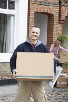 Professional flat removals in Waterloo with packed boxes and moving van