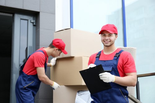 Family packing seasonal items for household storage in Waterloo