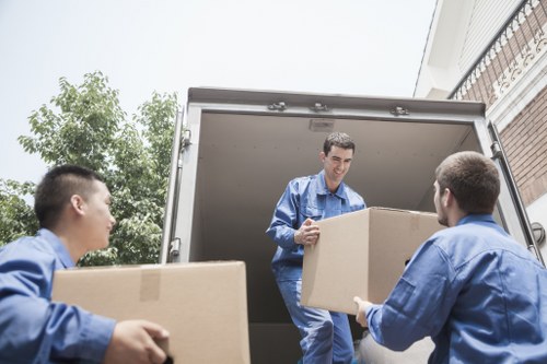 Moving team loading household items for removals in Waterloo