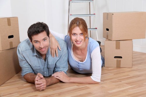 Professional movers handling furniture during house removals in Waterloo